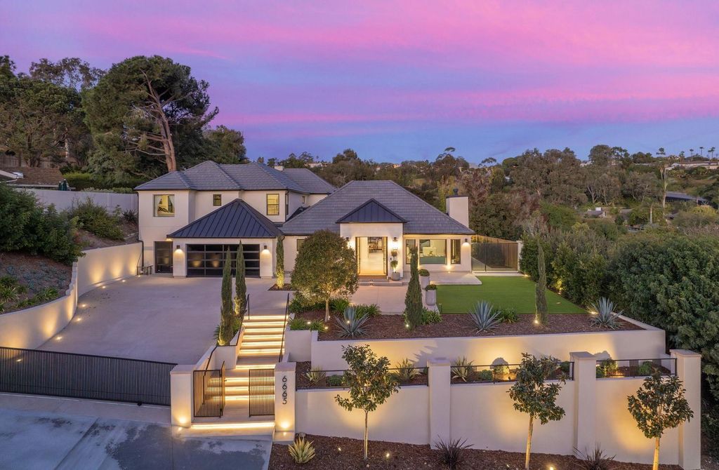 6665 Via Estrada Home in La Jolla, California. Step into the lap of luxury with this opulent residence in La Jolla, boasting over 6,000 square feet of meticulously designed space. Immerse yourself in sophistication with six en suite bedrooms, high-end finishes, and grand living areas.