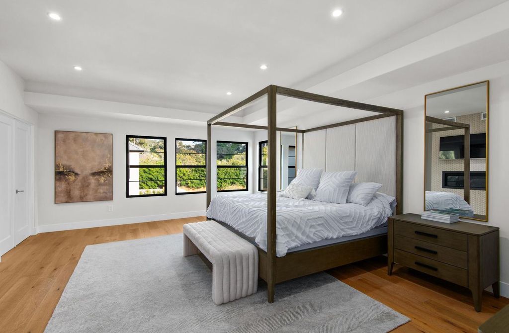 6665 Via Estrada Home in La Jolla, California. Step into the lap of luxury with this opulent residence in La Jolla, boasting over 6,000 square feet of meticulously designed space. Immerse yourself in sophistication with six en suite bedrooms, high-end finishes, and grand living areas.