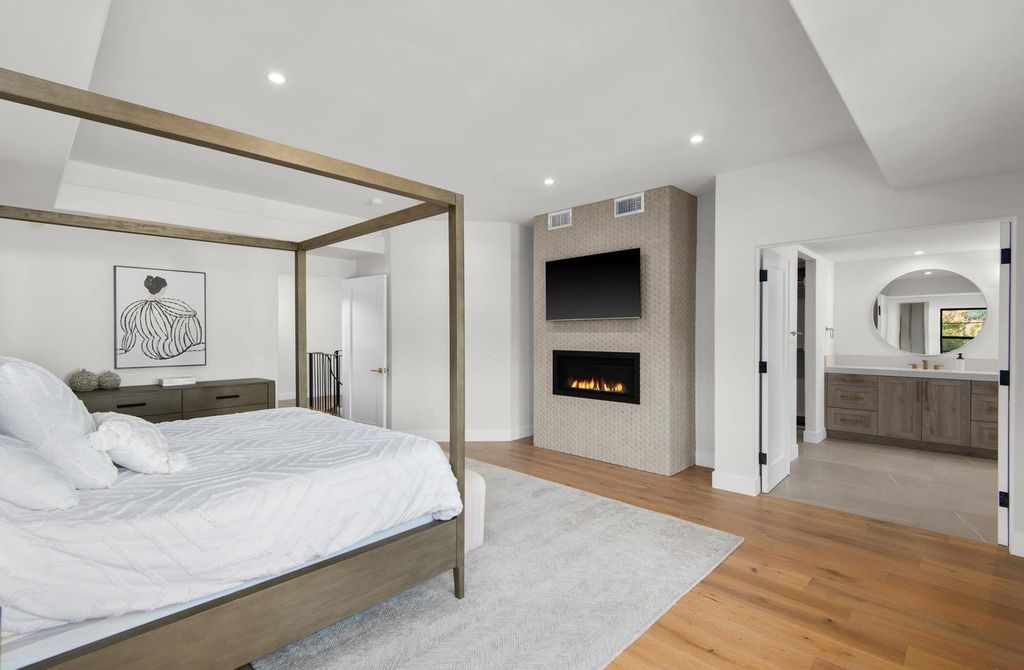 6665 Via Estrada Home in La Jolla, California. Step into the lap of luxury with this opulent residence in La Jolla, boasting over 6,000 square feet of meticulously designed space. Immerse yourself in sophistication with six en suite bedrooms, high-end finishes, and grand living areas.