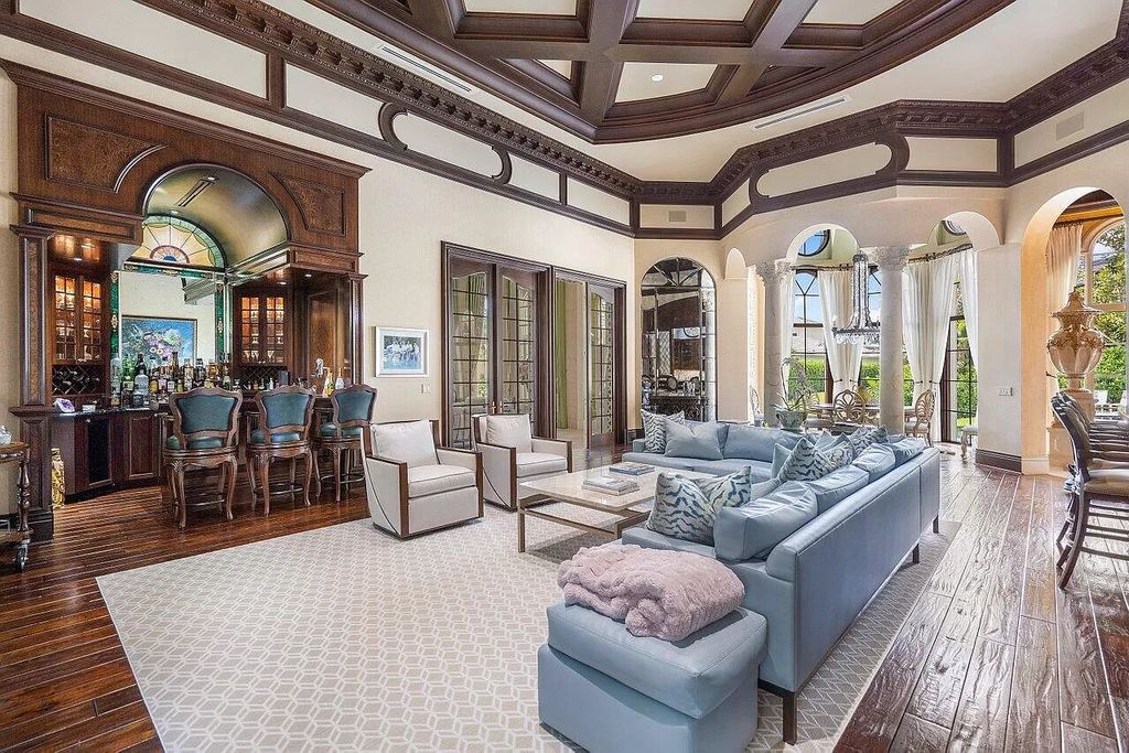 Discover the epitome of luxury living at 7894 Dunvagen Ct, a newly renovated masterpiece within Boca Raton's prestigious St. Andrews Country Club.