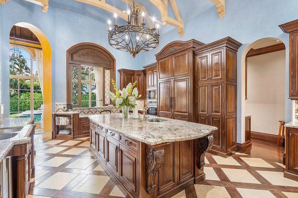 Discover the epitome of luxury living at 7894 Dunvagen Ct, a newly renovated masterpiece within Boca Raton's prestigious St. Andrews Country Club.
