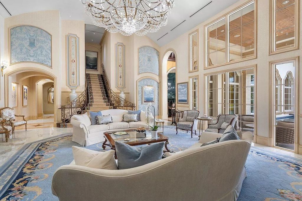 Discover the epitome of luxury living at 7894 Dunvagen Ct, a newly renovated masterpiece within Boca Raton's prestigious St. Andrews Country Club.