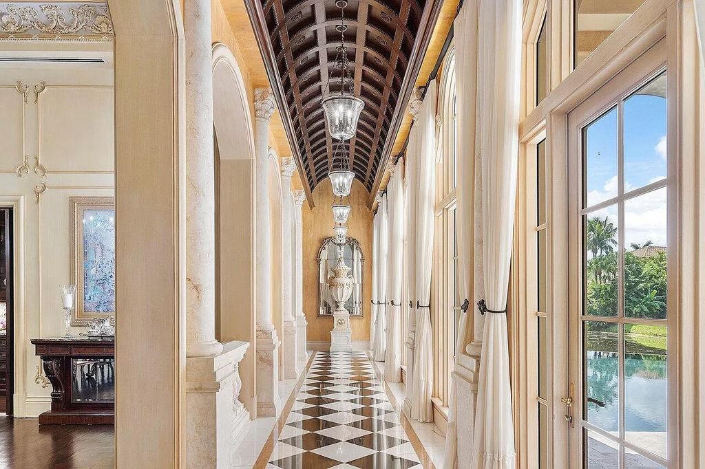 Discover the epitome of luxury living at 7894 Dunvagen Ct, a newly renovated masterpiece within Boca Raton's prestigious St. Andrews Country Club.