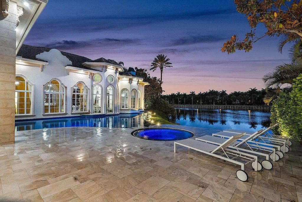 Discover the epitome of luxury living at 7894 Dunvagen Ct, a newly renovated masterpiece within Boca Raton's prestigious St. Andrews Country Club.