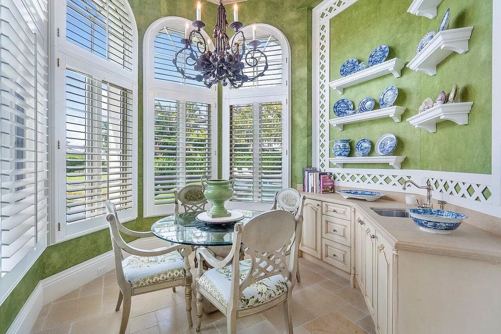 Discover the epitome of luxury living at 7894 Dunvagen Ct, a newly renovated masterpiece within Boca Raton's prestigious St. Andrews Country Club.