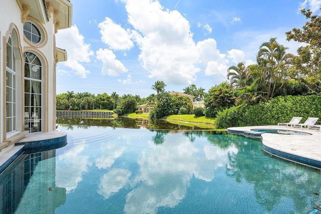 Discover the epitome of luxury living at 7894 Dunvagen Ct, a newly renovated masterpiece within Boca Raton's prestigious St. Andrews Country Club.