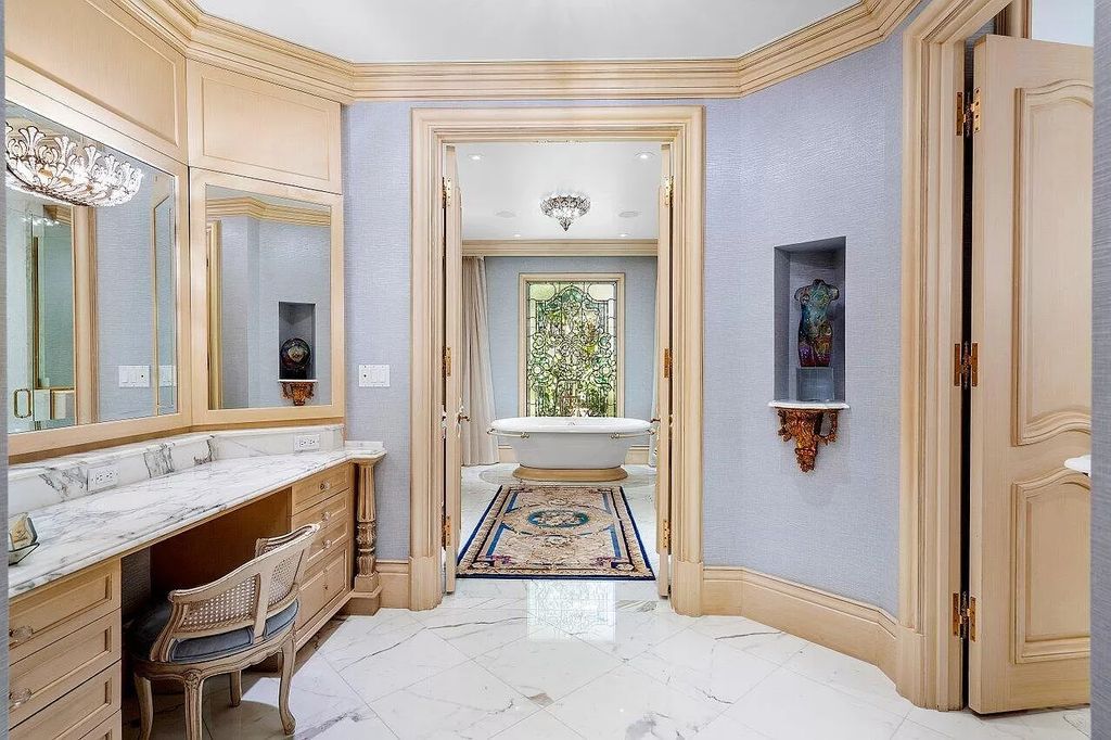 Discover the epitome of luxury living at 7894 Dunvagen Ct, a newly renovated masterpiece within Boca Raton's prestigious St. Andrews Country Club.