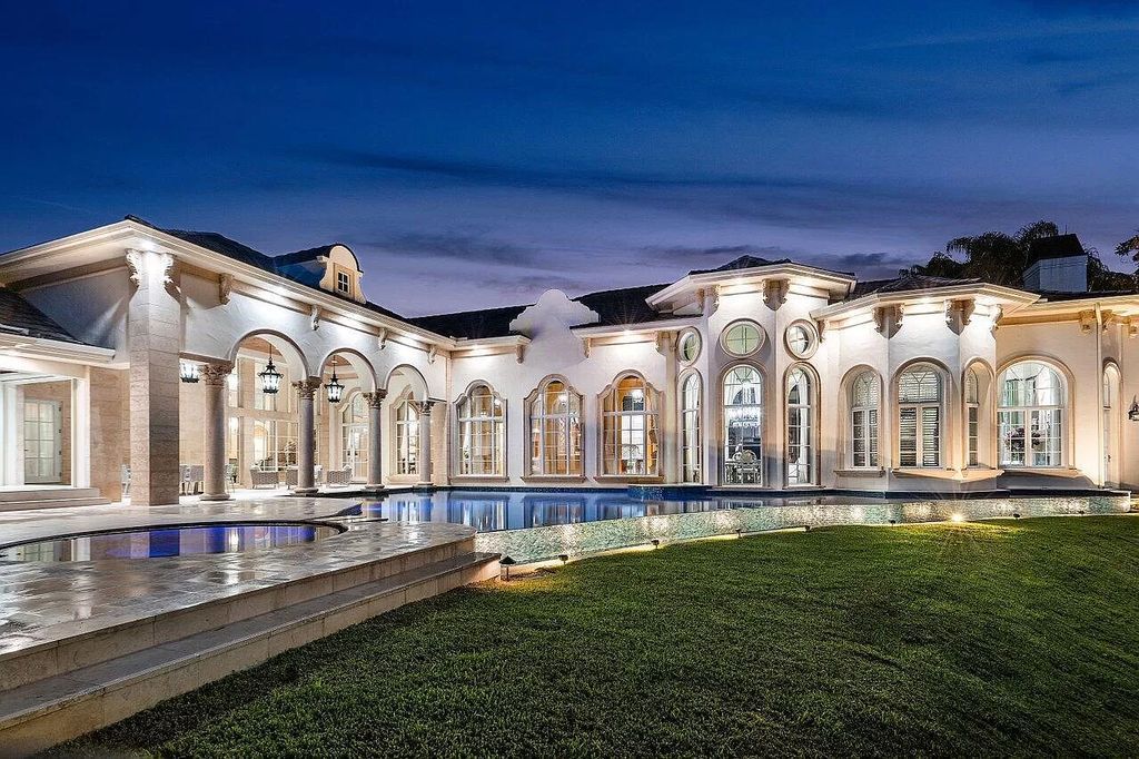Discover the epitome of luxury living at 7894 Dunvagen Ct, a newly renovated masterpiece within Boca Raton's prestigious St. Andrews Country Club.