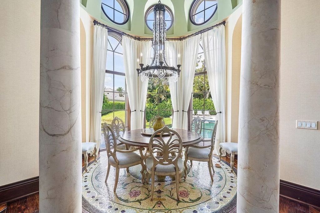 Discover the epitome of luxury living at 7894 Dunvagen Ct, a newly renovated masterpiece within Boca Raton's prestigious St. Andrews Country Club.