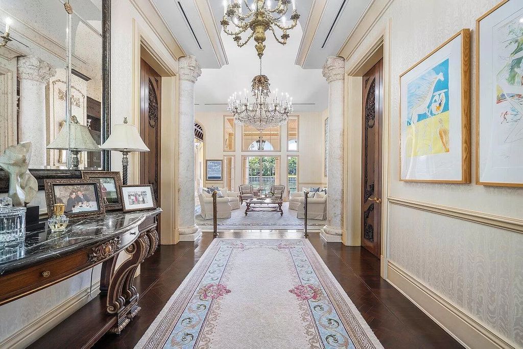 Discover the epitome of luxury living at 7894 Dunvagen Ct, a newly renovated masterpiece within Boca Raton's prestigious St. Andrews Country Club.