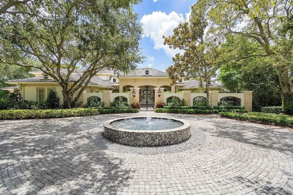 Discover the epitome of luxury living at 7894 Dunvagen Ct, a newly renovated masterpiece within Boca Raton's prestigious St. Andrews Country Club.
