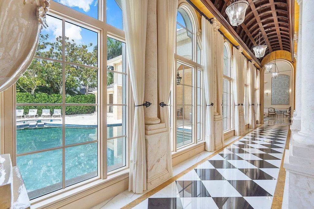 Discover the epitome of luxury living at 7894 Dunvagen Ct, a newly renovated masterpiece within Boca Raton's prestigious St. Andrews Country Club.