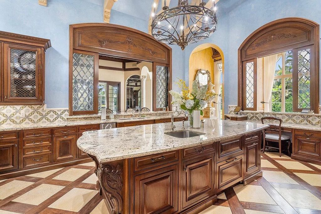 Discover the epitome of luxury living at 7894 Dunvagen Ct, a newly renovated masterpiece within Boca Raton's prestigious St. Andrews Country Club.