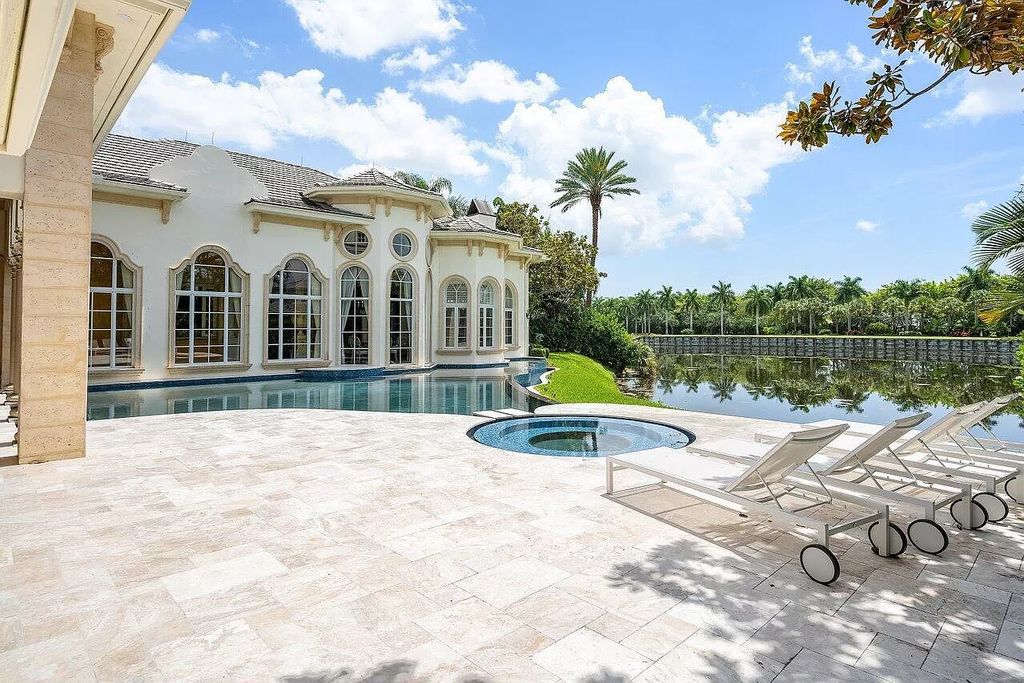 Discover the epitome of luxury living at 7894 Dunvagen Ct, a newly renovated masterpiece within Boca Raton's prestigious St. Andrews Country Club.