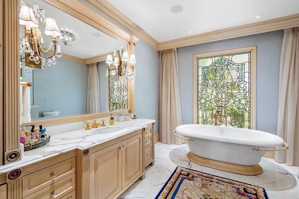 Discover the epitome of luxury living at 7894 Dunvagen Ct, a newly renovated masterpiece within Boca Raton's prestigious St. Andrews Country Club.