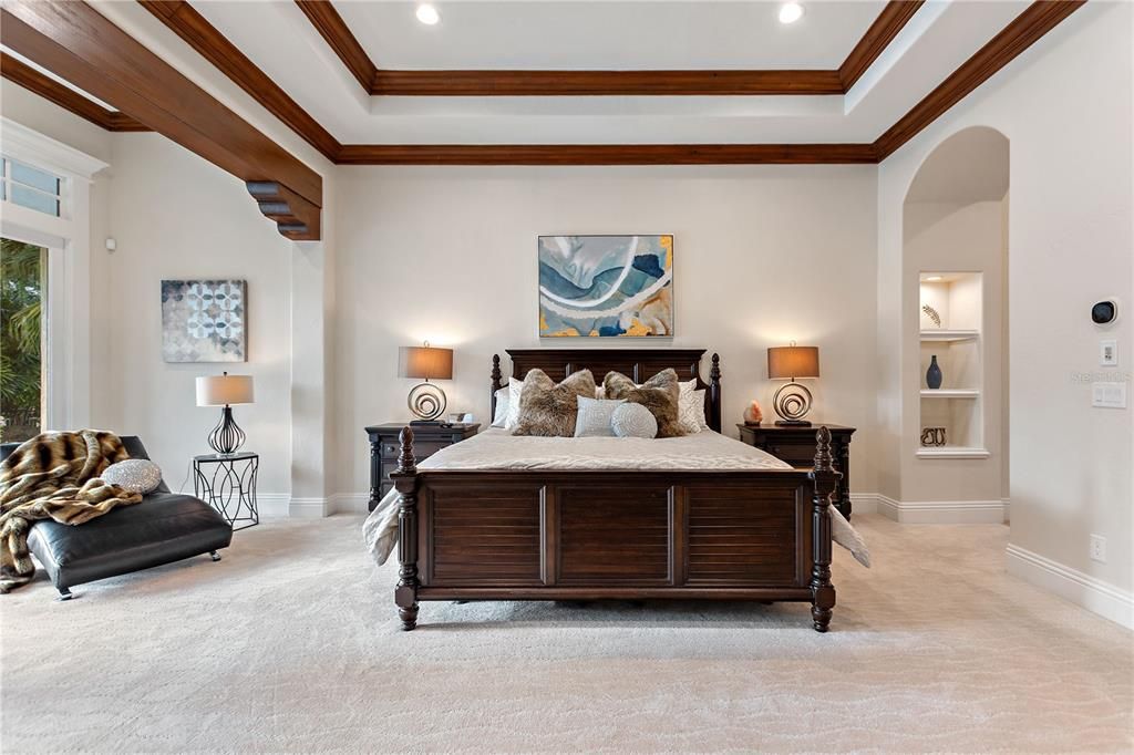 Named "Millionaires Cove," this Tudor Tuscan marvel blends Balinese and Indian influences. The gated community, housing only 29 residences, with 10 enjoying private lake access, ensures exclusive serenity.