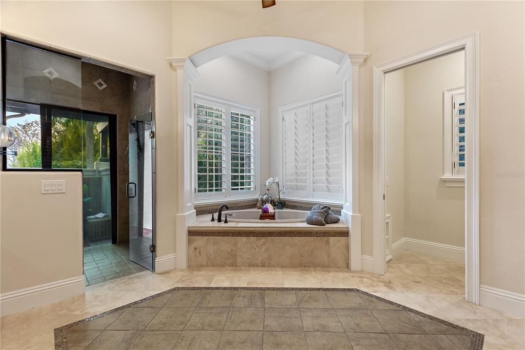 Named "Millionaires Cove," this Tudor Tuscan marvel blends Balinese and Indian influences. The gated community, housing only 29 residences, with 10 enjoying private lake access, ensures exclusive serenity.