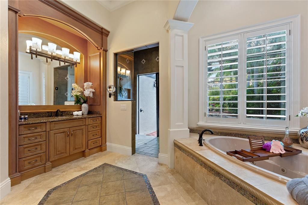 Named "Millionaires Cove," this Tudor Tuscan marvel blends Balinese and Indian influences. The gated community, housing only 29 residences, with 10 enjoying private lake access, ensures exclusive serenity.