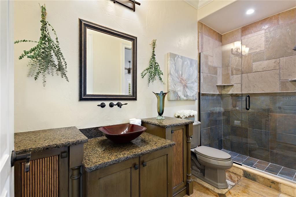 Named "Millionaires Cove," this Tudor Tuscan marvel blends Balinese and Indian influences. The gated community, housing only 29 residences, with 10 enjoying private lake access, ensures exclusive serenity.