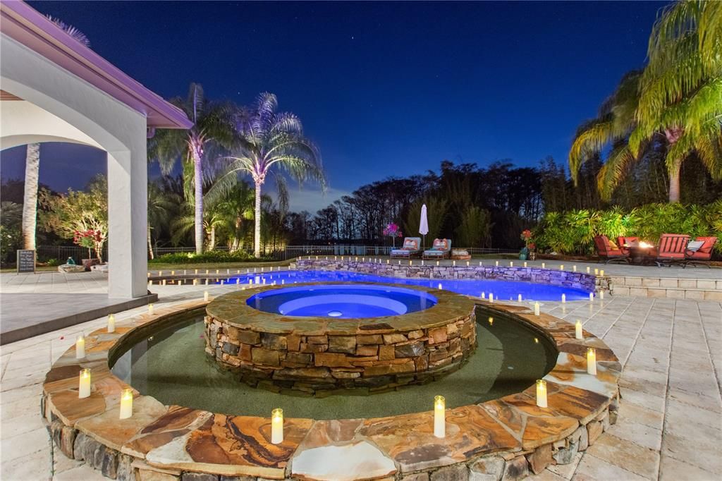 Named "Millionaires Cove," this Tudor Tuscan marvel blends Balinese and Indian influences. The gated community, housing only 29 residences, with 10 enjoying private lake access, ensures exclusive serenity.