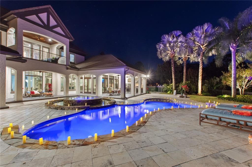 Named "Millionaires Cove," this Tudor Tuscan marvel blends Balinese and Indian influences. The gated community, housing only 29 residences, with 10 enjoying private lake access, ensures exclusive serenity.
