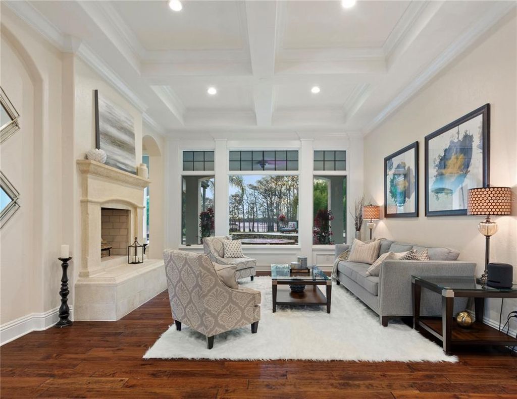 Named "Millionaires Cove," this Tudor Tuscan marvel blends Balinese and Indian influences. The gated community, housing only 29 residences, with 10 enjoying private lake access, ensures exclusive serenity.