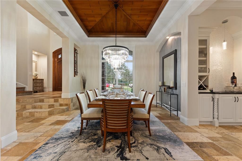 Named "Millionaires Cove," this Tudor Tuscan marvel blends Balinese and Indian influences. The gated community, housing only 29 residences, with 10 enjoying private lake access, ensures exclusive serenity.