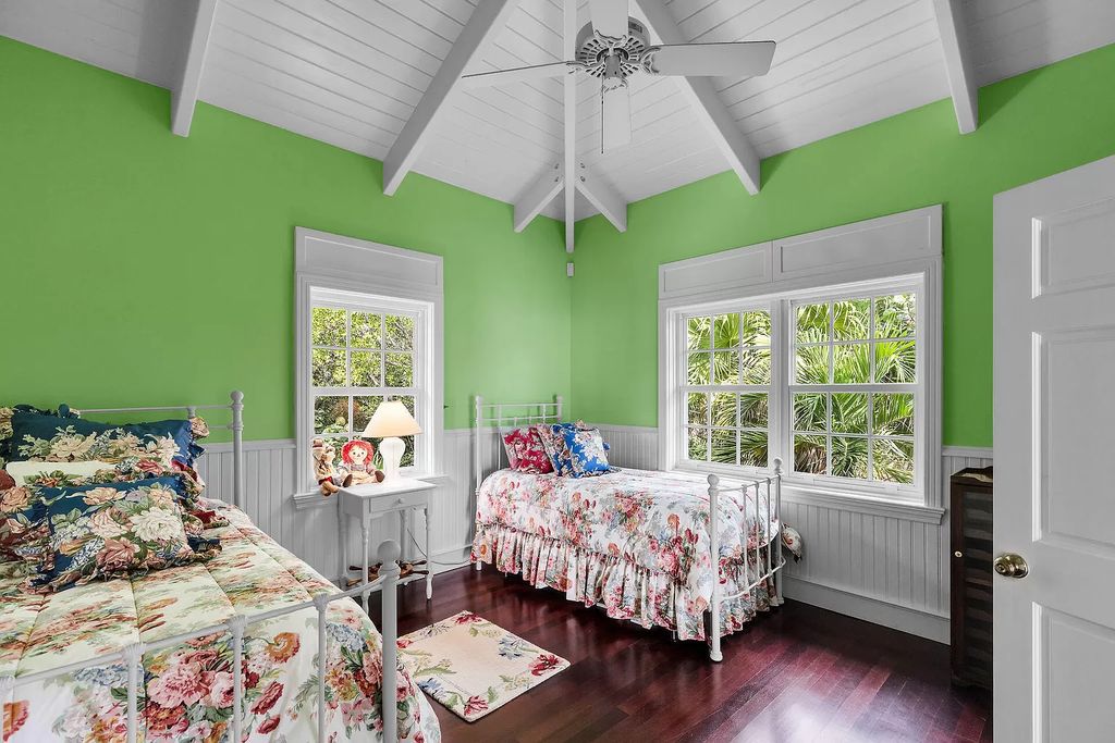 Experience the epitome of luxury island living at this exquisite Luxury Oceanfront Estate in Islamorada. Nestled on 10.85 acres along the Atlantic Ocean, this 2006-built property offers 450 feet of pristine beachfront accessed through a private, gated entrance.