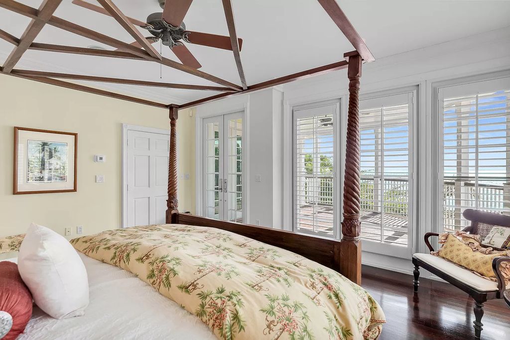 Experience the epitome of luxury island living at this exquisite Luxury Oceanfront Estate in Islamorada. Nestled on 10.85 acres along the Atlantic Ocean, this 2006-built property offers 450 feet of pristine beachfront accessed through a private, gated entrance.