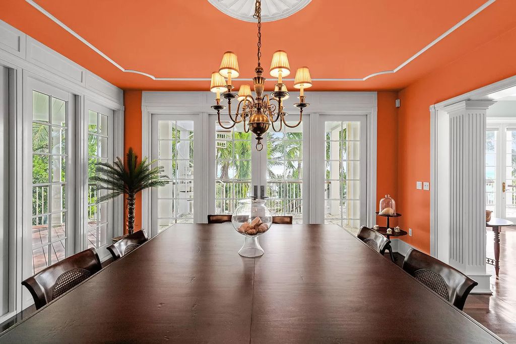 Experience the epitome of luxury island living at this exquisite Luxury Oceanfront Estate in Islamorada. Nestled on 10.85 acres along the Atlantic Ocean, this 2006-built property offers 450 feet of pristine beachfront accessed through a private, gated entrance.