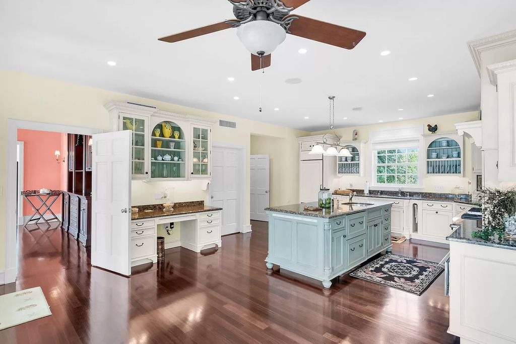 Experience the epitome of luxury island living at this exquisite Luxury Oceanfront Estate in Islamorada. Nestled on 10.85 acres along the Atlantic Ocean, this 2006-built property offers 450 feet of pristine beachfront accessed through a private, gated entrance.