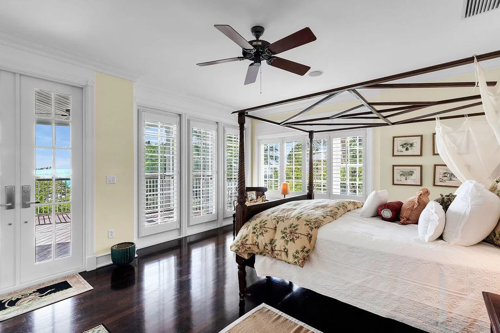 Experience the epitome of luxury island living at this exquisite Luxury Oceanfront Estate in Islamorada. Nestled on 10.85 acres along the Atlantic Ocean, this 2006-built property offers 450 feet of pristine beachfront accessed through a private, gated entrance.