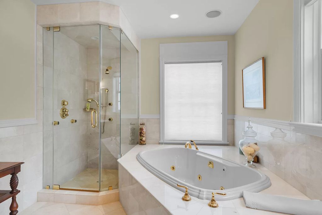 Experience the epitome of luxury island living at this exquisite Luxury Oceanfront Estate in Islamorada. Nestled on 10.85 acres along the Atlantic Ocean, this 2006-built property offers 450 feet of pristine beachfront accessed through a private, gated entrance.