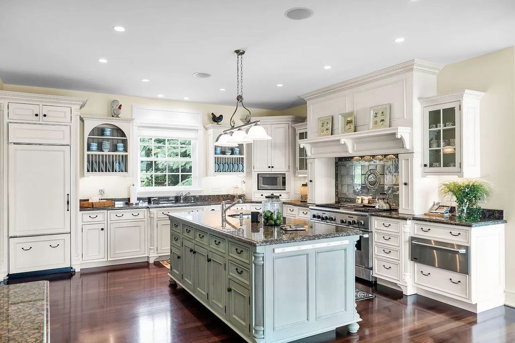 Experience the epitome of luxury island living at this exquisite Luxury Oceanfront Estate in Islamorada. Nestled on 10.85 acres along the Atlantic Ocean, this 2006-built property offers 450 feet of pristine beachfront accessed through a private, gated entrance.