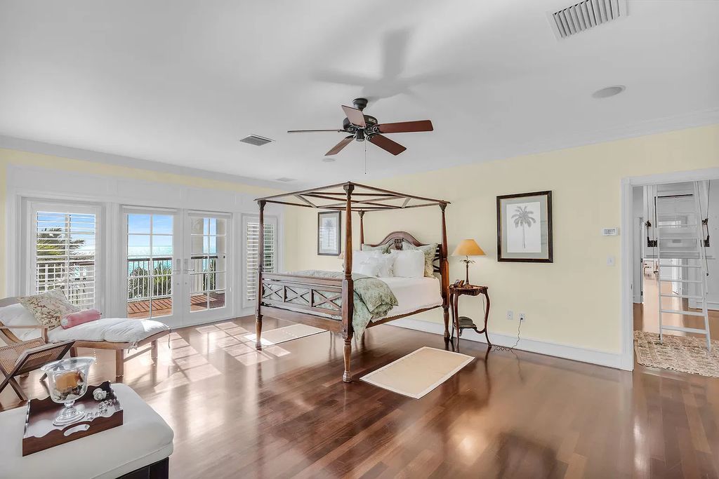 Experience the epitome of luxury island living at this exquisite Luxury Oceanfront Estate in Islamorada. Nestled on 10.85 acres along the Atlantic Ocean, this 2006-built property offers 450 feet of pristine beachfront accessed through a private, gated entrance.