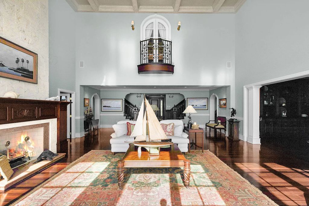 Experience the epitome of luxury island living at this exquisite Luxury Oceanfront Estate in Islamorada. Nestled on 10.85 acres along the Atlantic Ocean, this 2006-built property offers 450 feet of pristine beachfront accessed through a private, gated entrance.