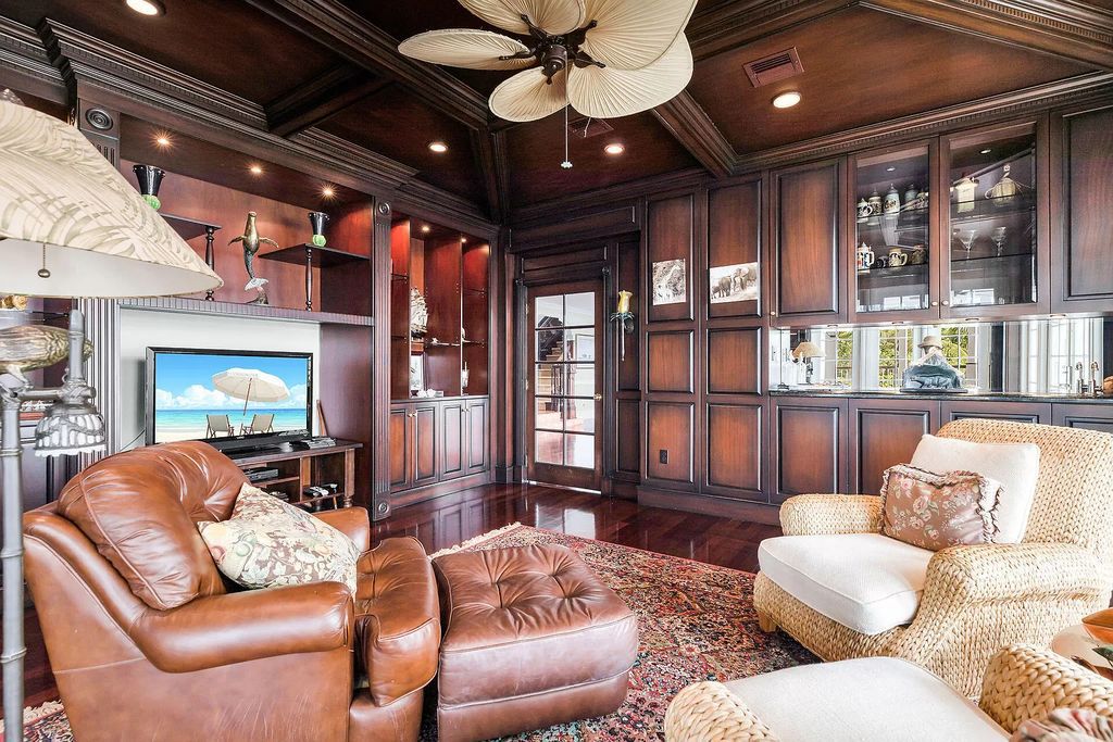 Experience the epitome of luxury island living at this exquisite Luxury Oceanfront Estate in Islamorada. Nestled on 10.85 acres along the Atlantic Ocean, this 2006-built property offers 450 feet of pristine beachfront accessed through a private, gated entrance.