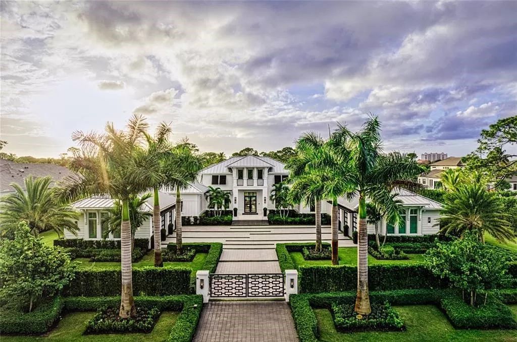 This sprawling 7,200 square feet single-story masterpiece in Pine Ridge epitomizes luxury living. With 6 bedrooms, a den, and a 6-car garage on a 1.31-acre lot, it boasts a wood-paneled library, a soaring two-story living room, and a gourmet kitchen with Wolf and Sub-Zero appliances.