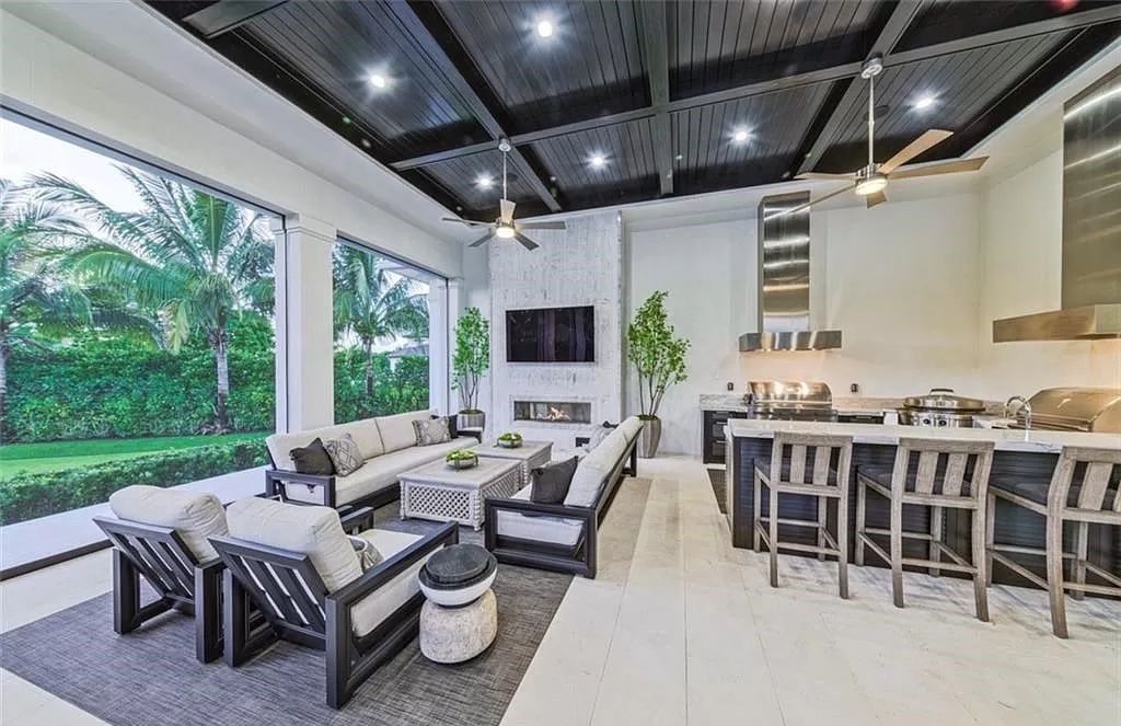This sprawling 7,200 square feet single-story masterpiece in Pine Ridge epitomizes luxury living. With 6 bedrooms, a den, and a 6-car garage on a 1.31-acre lot, it boasts a wood-paneled library, a soaring two-story living room, and a gourmet kitchen with Wolf and Sub-Zero appliances.