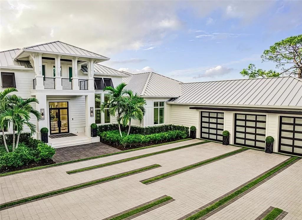 This sprawling 7,200 square feet single-story masterpiece in Pine Ridge epitomizes luxury living. With 6 bedrooms, a den, and a 6-car garage on a 1.31-acre lot, it boasts a wood-paneled library, a soaring two-story living room, and a gourmet kitchen with Wolf and Sub-Zero appliances.