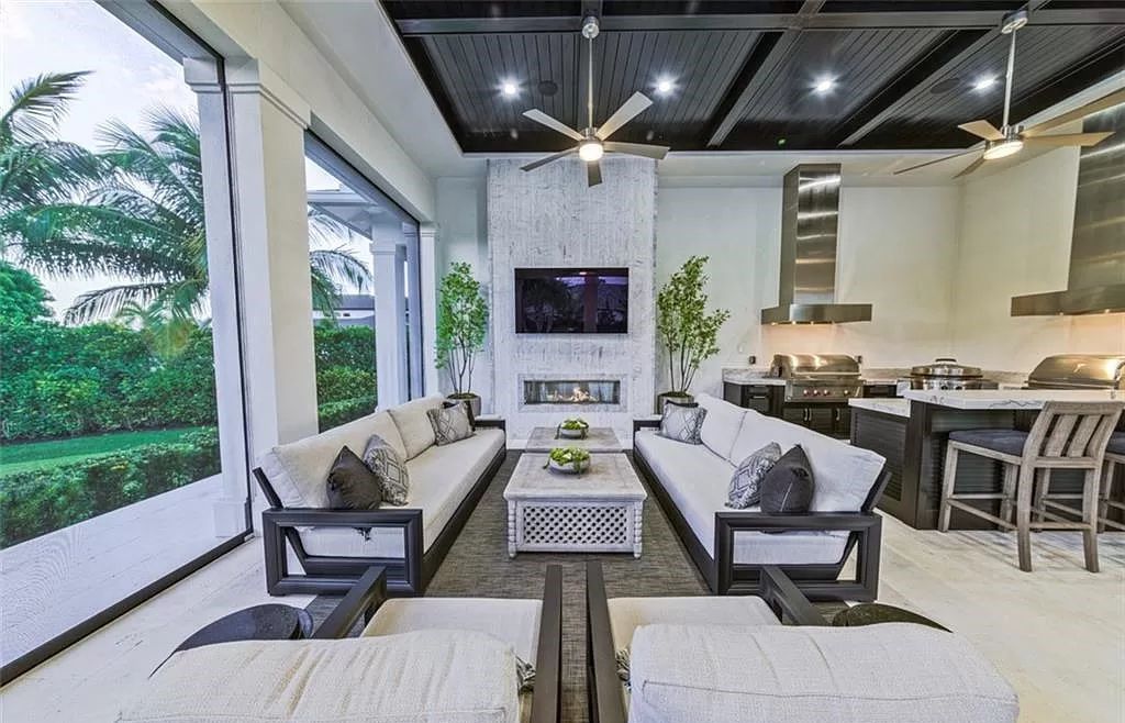 This sprawling 7,200 square feet single-story masterpiece in Pine Ridge epitomizes luxury living. With 6 bedrooms, a den, and a 6-car garage on a 1.31-acre lot, it boasts a wood-paneled library, a soaring two-story living room, and a gourmet kitchen with Wolf and Sub-Zero appliances.