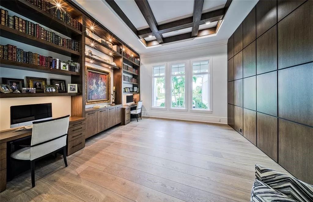 This sprawling 7,200 square feet single-story masterpiece in Pine Ridge epitomizes luxury living. With 6 bedrooms, a den, and a 6-car garage on a 1.31-acre lot, it boasts a wood-paneled library, a soaring two-story living room, and a gourmet kitchen with Wolf and Sub-Zero appliances.