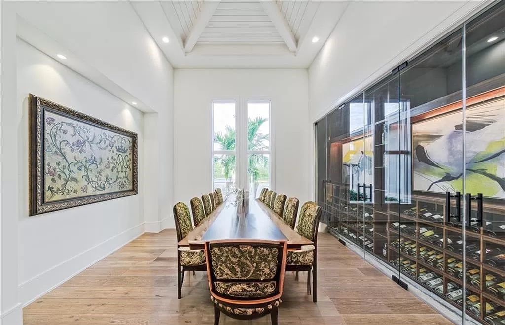 This sprawling 7,200 square feet single-story masterpiece in Pine Ridge epitomizes luxury living. With 6 bedrooms, a den, and a 6-car garage on a 1.31-acre lot, it boasts a wood-paneled library, a soaring two-story living room, and a gourmet kitchen with Wolf and Sub-Zero appliances.