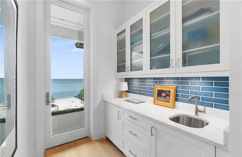 Welcome to 26854 Hickory Blvd, a 5-bed/5-bath beachfront masterpiece in Bonita Springs, FL. Built by Potter Homes and designed by Kukk Architects in 2017, this 4,647 square feet home boasts spectacular Gulf views from every floor.