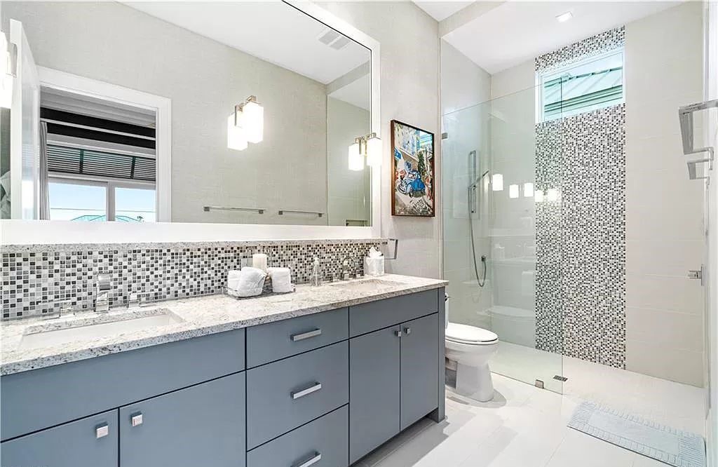 Welcome to 26854 Hickory Blvd, a 5-bed/5-bath beachfront masterpiece in Bonita Springs, FL. Built by Potter Homes and designed by Kukk Architects in 2017, this 4,647 square feet home boasts spectacular Gulf views from every floor.