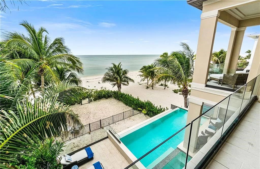 Welcome to 26854 Hickory Blvd, a 5-bed/5-bath beachfront masterpiece in Bonita Springs, FL. Built by Potter Homes and designed by Kukk Architects in 2017, this 4,647 square feet home boasts spectacular Gulf views from every floor.