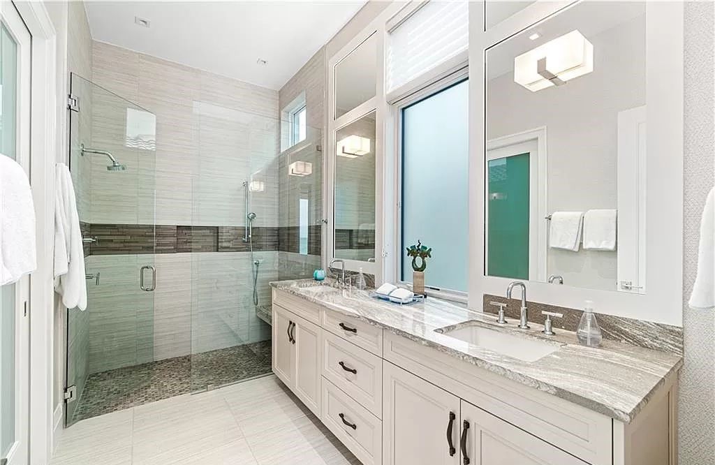 Welcome to 26854 Hickory Blvd, a 5-bed/5-bath beachfront masterpiece in Bonita Springs, FL. Built by Potter Homes and designed by Kukk Architects in 2017, this 4,647 square feet home boasts spectacular Gulf views from every floor.