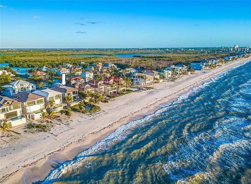 Welcome to 26854 Hickory Blvd, a 5-bed/5-bath beachfront masterpiece in Bonita Springs, FL. Built by Potter Homes and designed by Kukk Architects in 2017, this 4,647 square feet home boasts spectacular Gulf views from every floor.