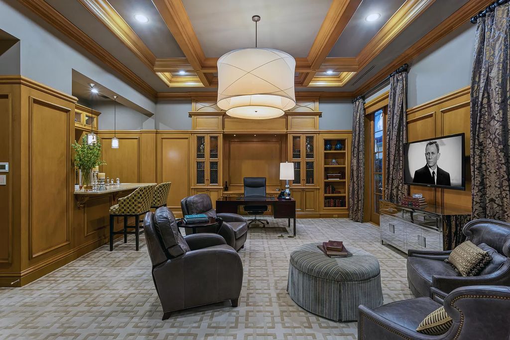 Crafted by Frankel Estate Homes, designed by Carlos Martin Architects, and styled by Marc-Michaels, this 6-bedroom, 10-bathroom mansion showcases an elegant staircase, grand salon, modern kitchen, and a lavish primary suite with waterfront vistas.