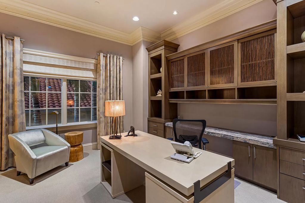 Crafted by Frankel Estate Homes, designed by Carlos Martin Architects, and styled by Marc-Michaels, this 6-bedroom, 10-bathroom mansion showcases an elegant staircase, grand salon, modern kitchen, and a lavish primary suite with waterfront vistas.